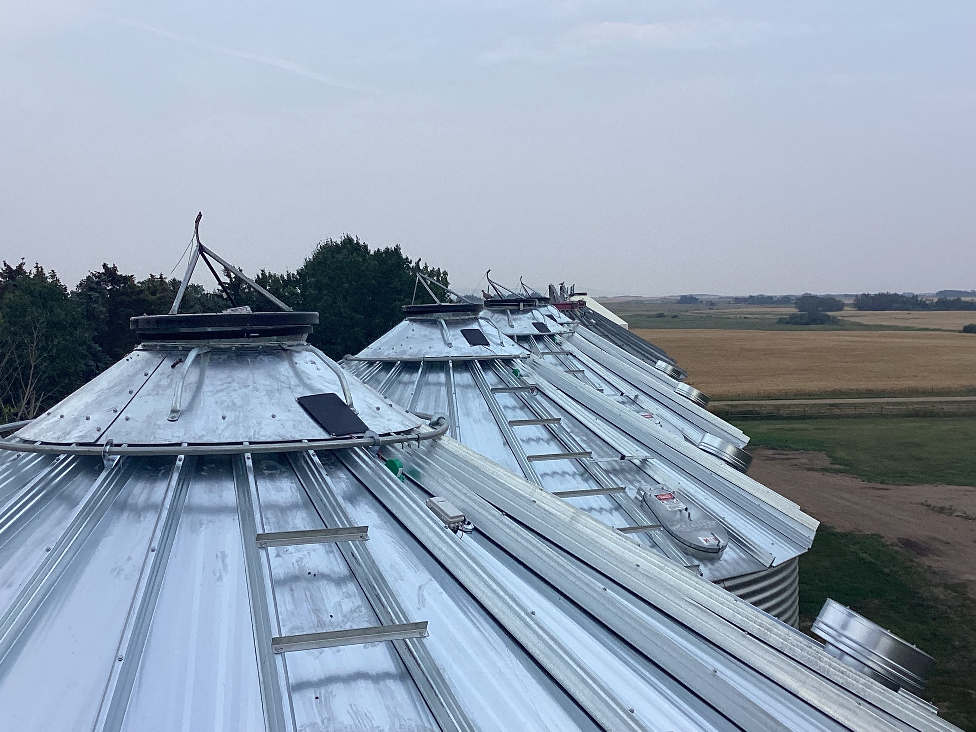 Grain bin rooftops with sensors installed